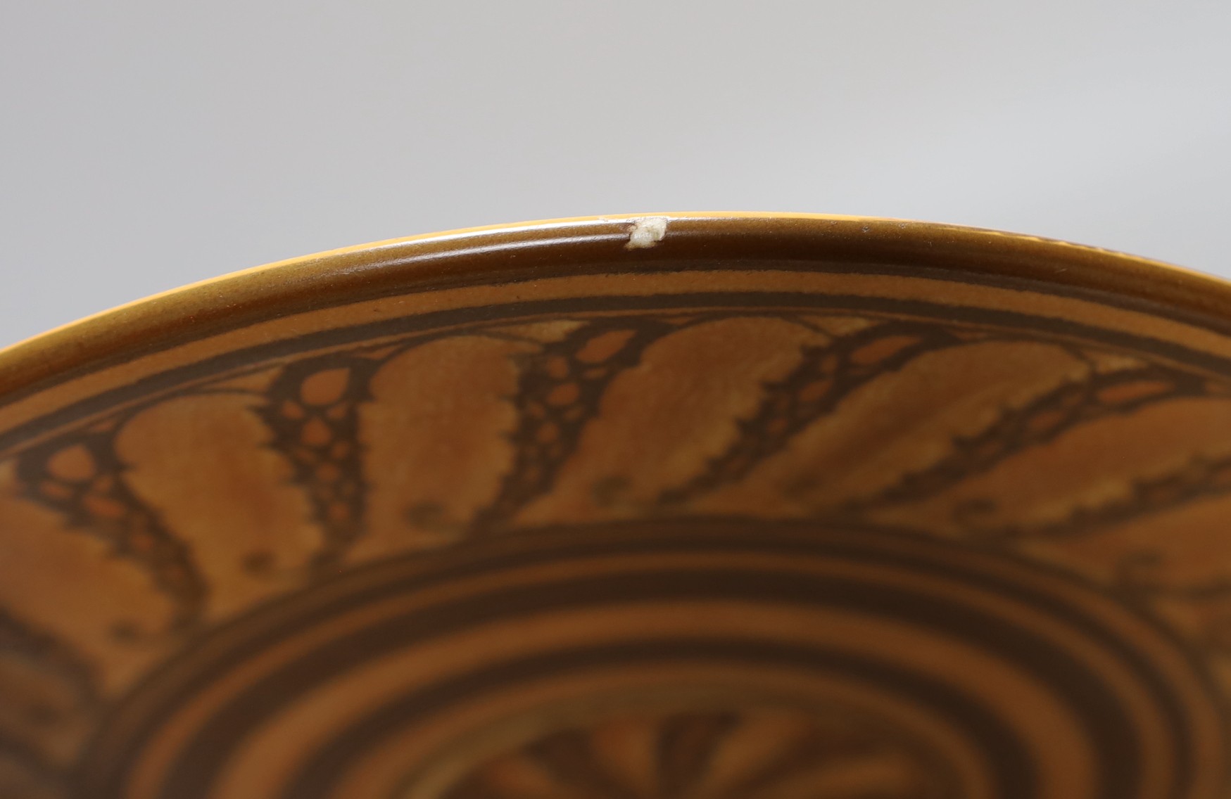A large Doulton wall plate, model no. D6061 - 34cm diameter and a Dutch Delft drug jar - 26cm tall